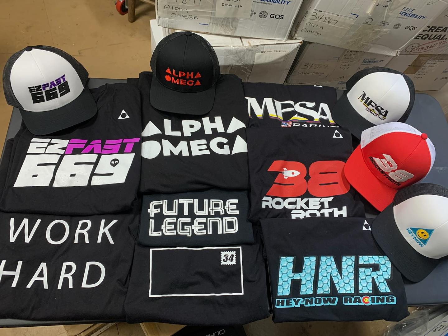 Custom shirts and hats flat lay